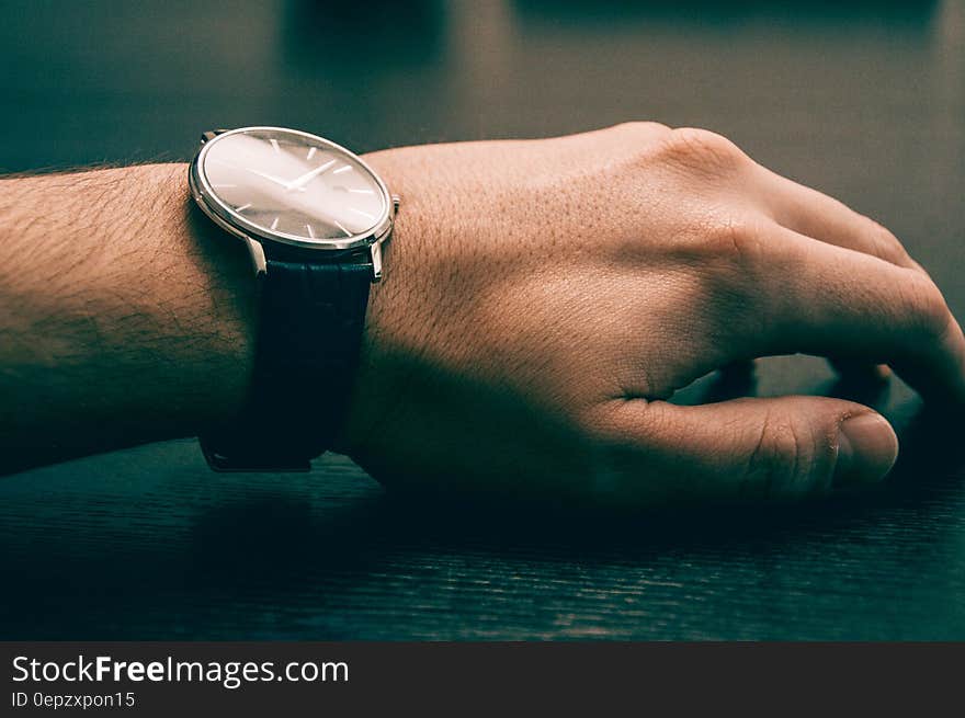 Close up of wristwatch on male arm. Close up of wristwatch on male arm.