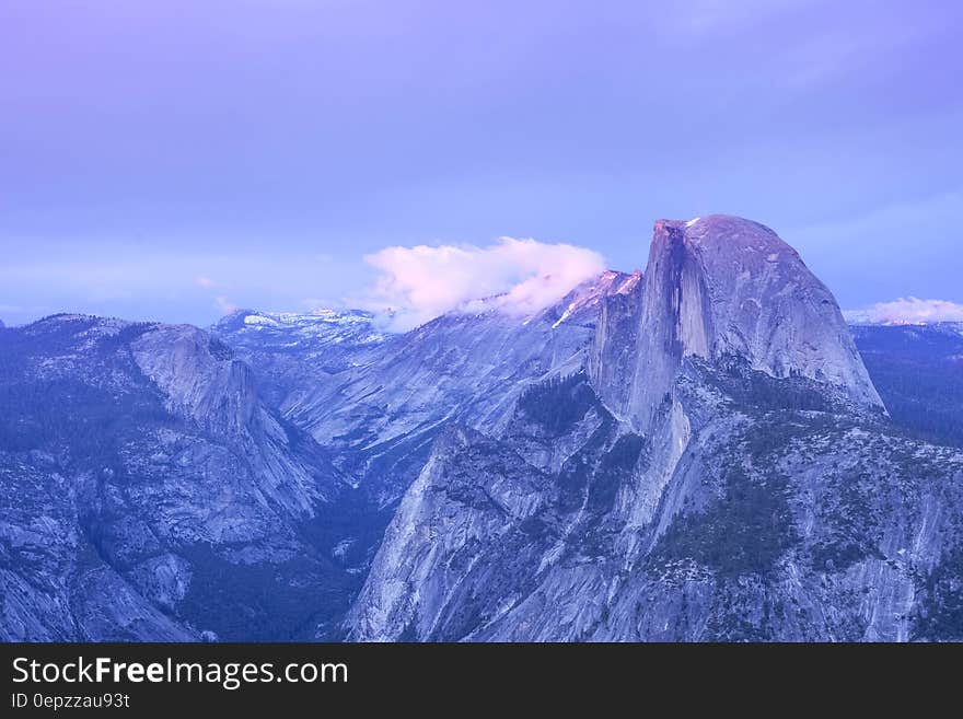 Mountains Under Cloudy Sky