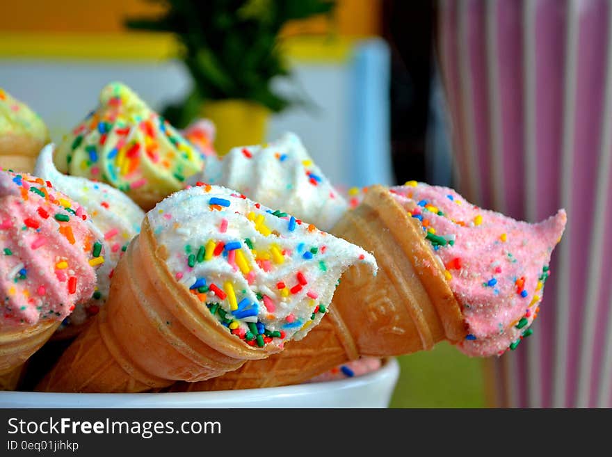 Brown Cone With White Sprinkled Icing