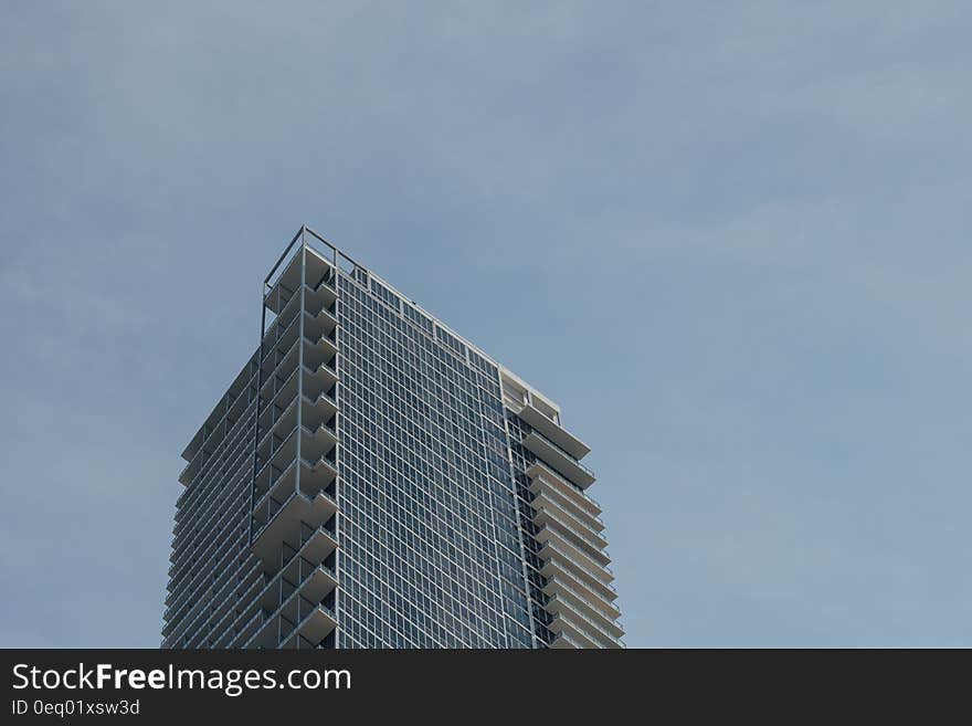 Low Angle Photo of Tower Building during Cloudy Sky