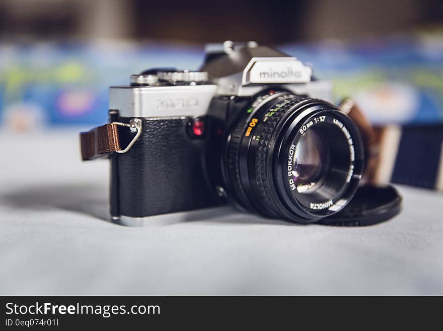 Minolta Grey and Black Mcla on Grey Table