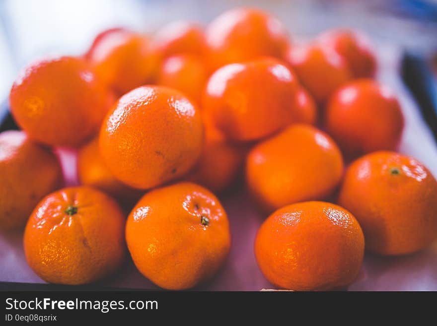 Shallow Focus Photography of Orange Fruits