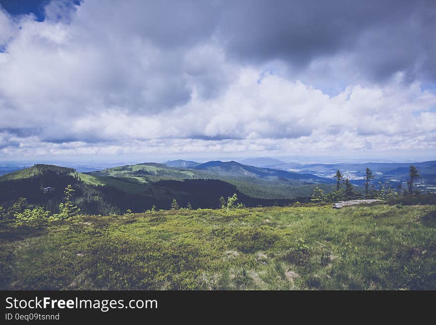 Green Mountain Under Blue Sky