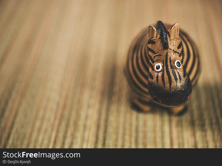 Close Photography of Beige and Black Zebra Toy