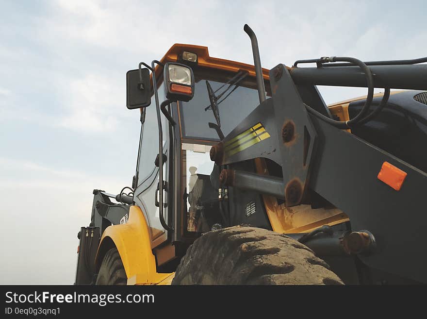 A tractor with a front loader.