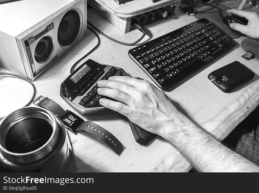 Grayscale Photography of Human Left Hand Near Computer Keyboard