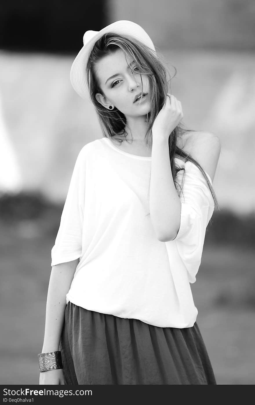 Woman Wearing White Off Shoulder Top in Gray Scale