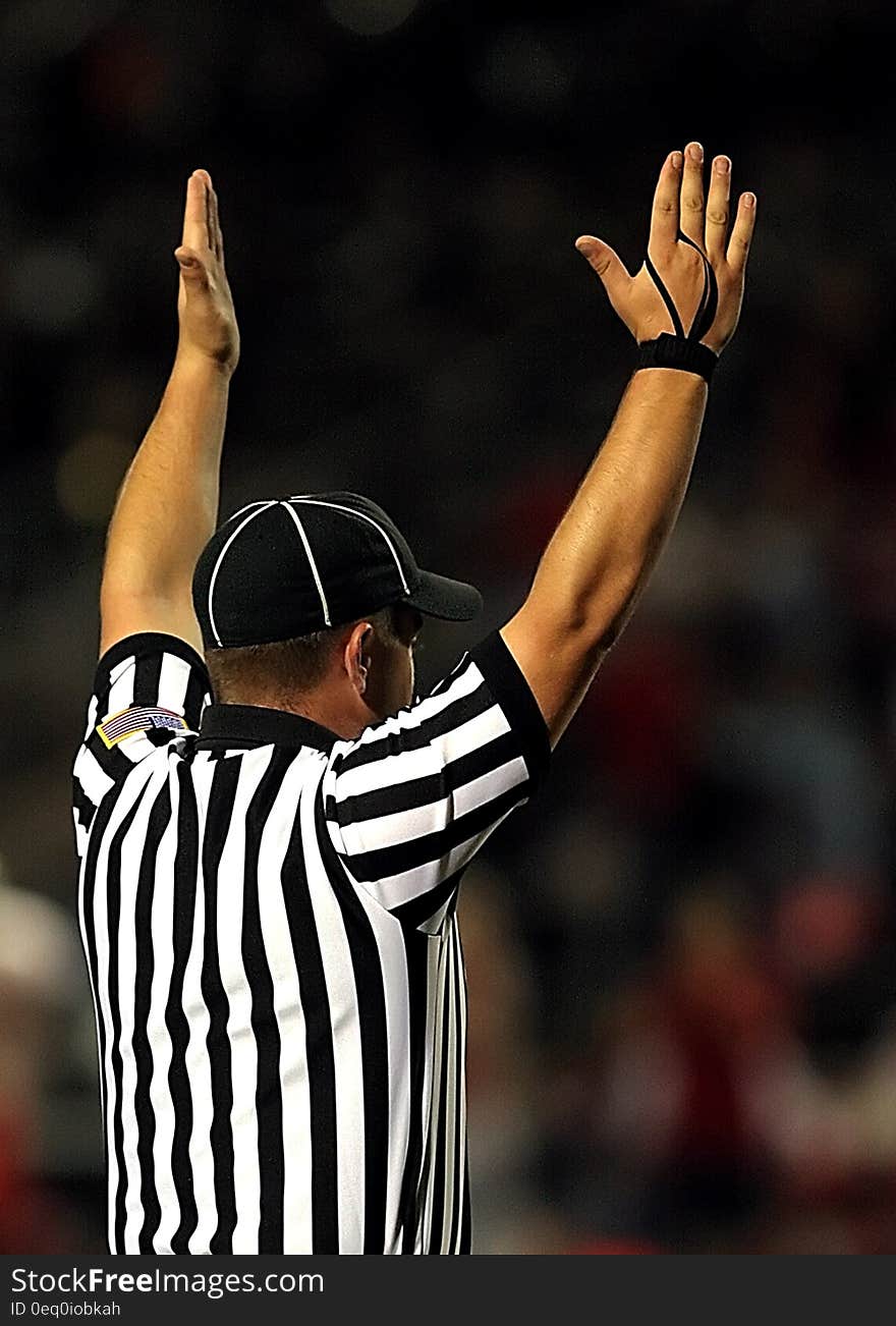 Referee Raising Both Hands