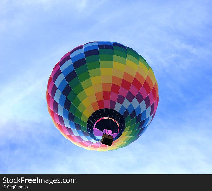 Hot Air Balloon Flying Under Blue Sky during Daytime