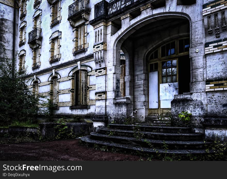 White Abandon Condominium during Day Time