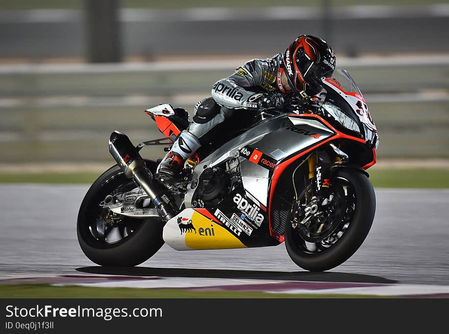 Rider&#x27;s Riding on Gray and Black Sports Bike