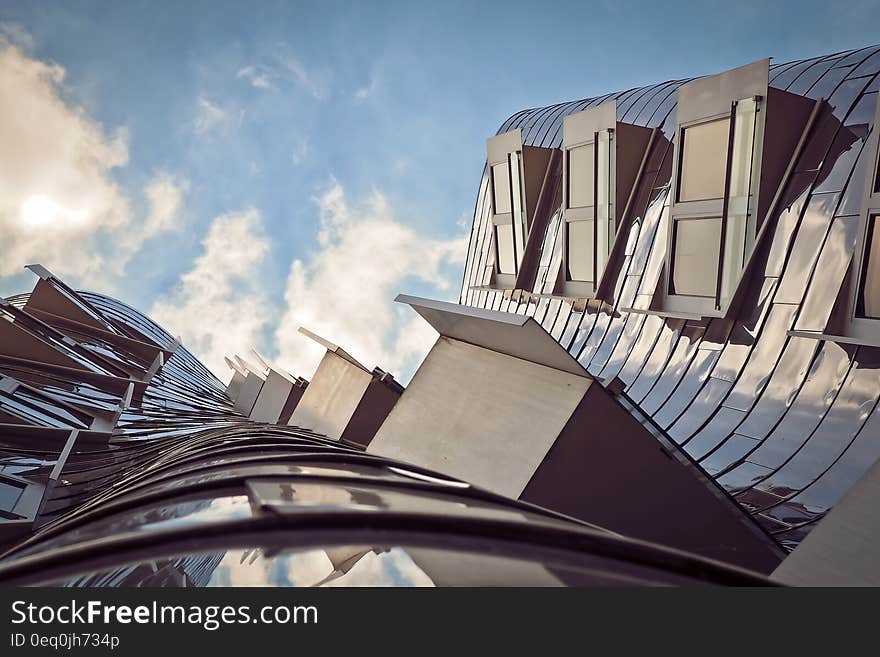 Low Angle Photo of Gray Building