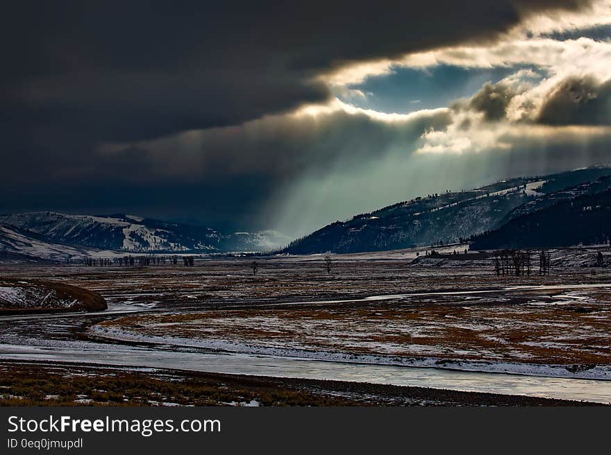 Empty Area Under Cloudy Sky at Daytime