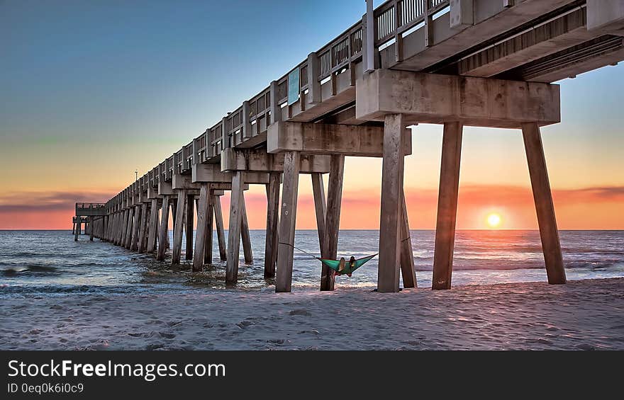 Brown Wooden Dock on Beach