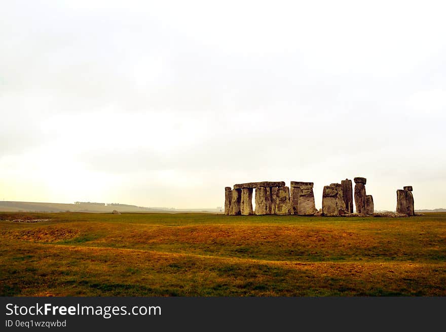 A morning light hitting the stones of Stonehenge.