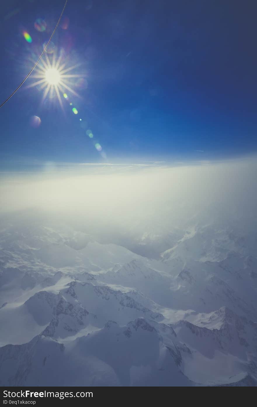 Snow Covered Mountain during Sunlight