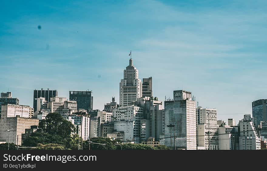 City Under Blue Cloudy Sky during Daytime