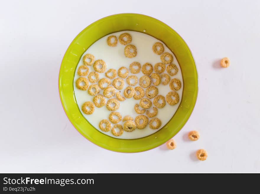 A bowl of cereal and milk.