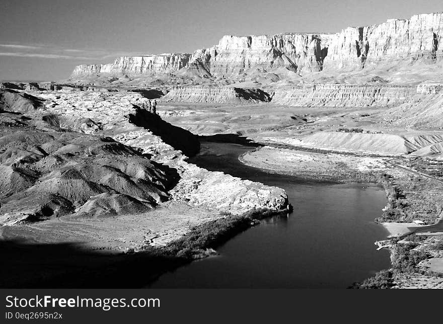 Black and White Photo of Mountains and River