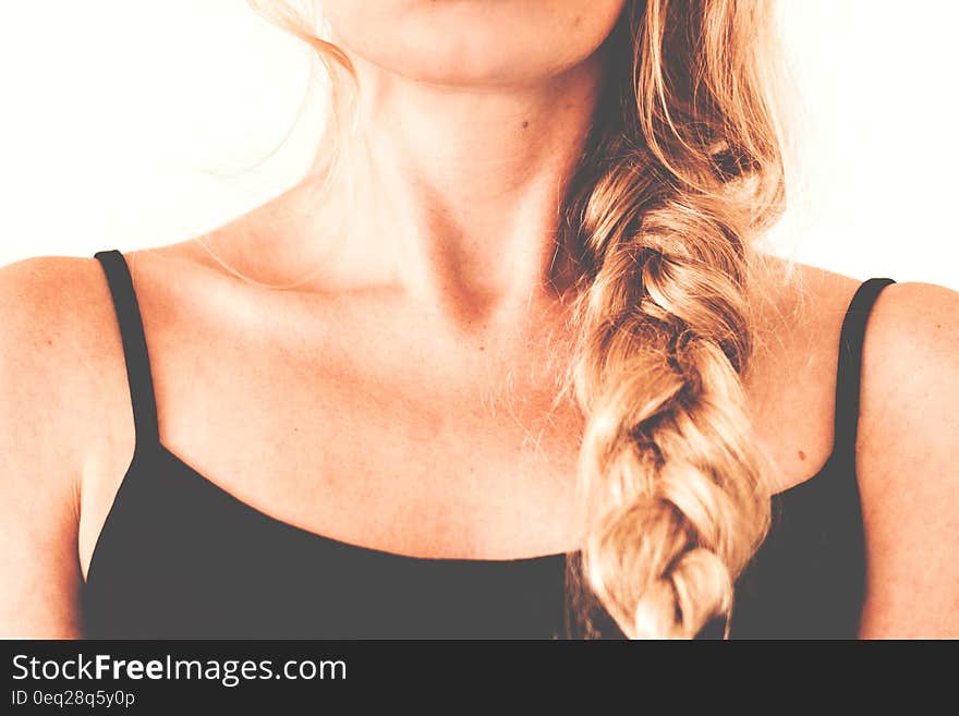 Woman in Black Tank Top With Braided Hair