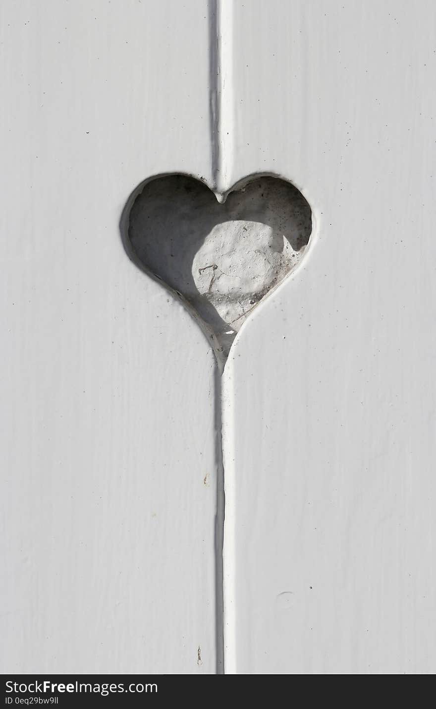 White Wooden Door With Heart Shape While Looking the Stars