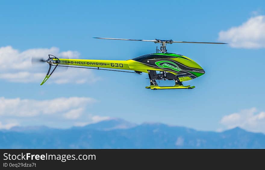 Green Black and Yellow Heli Division 630 Helicopter