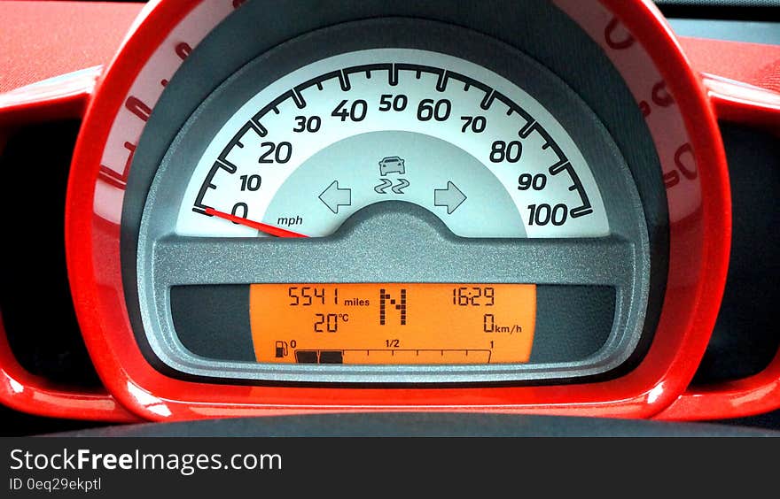 Red and Black Car Speedometer at Neutral