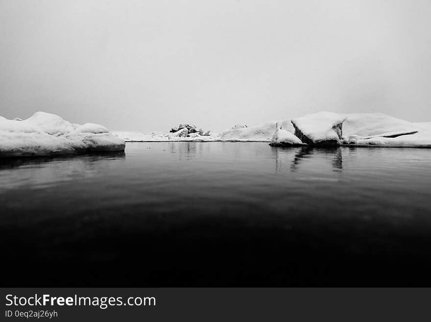 A black and white image of an ice lake.