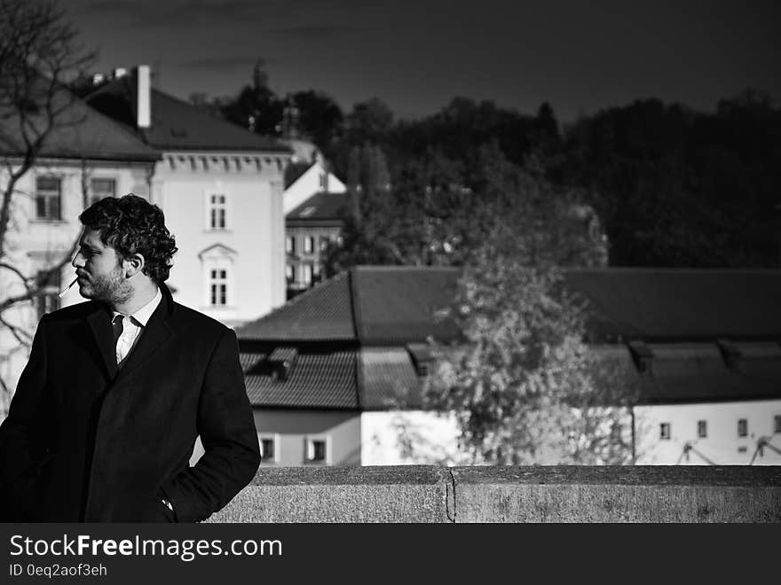 Grayscale Photo of Man in Suit