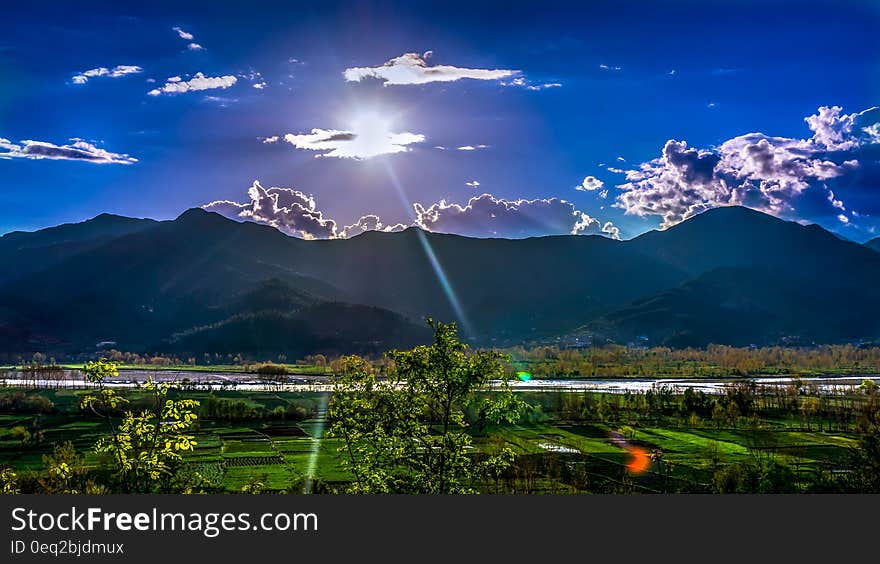 Sunlight Passing Through Grey Clouds