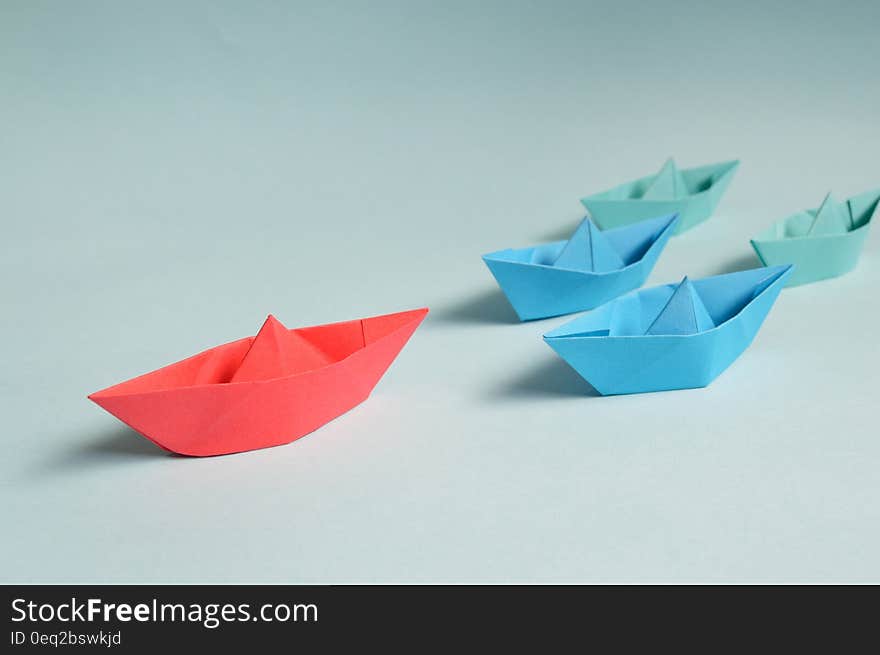 Paper Boats on Solid Surface