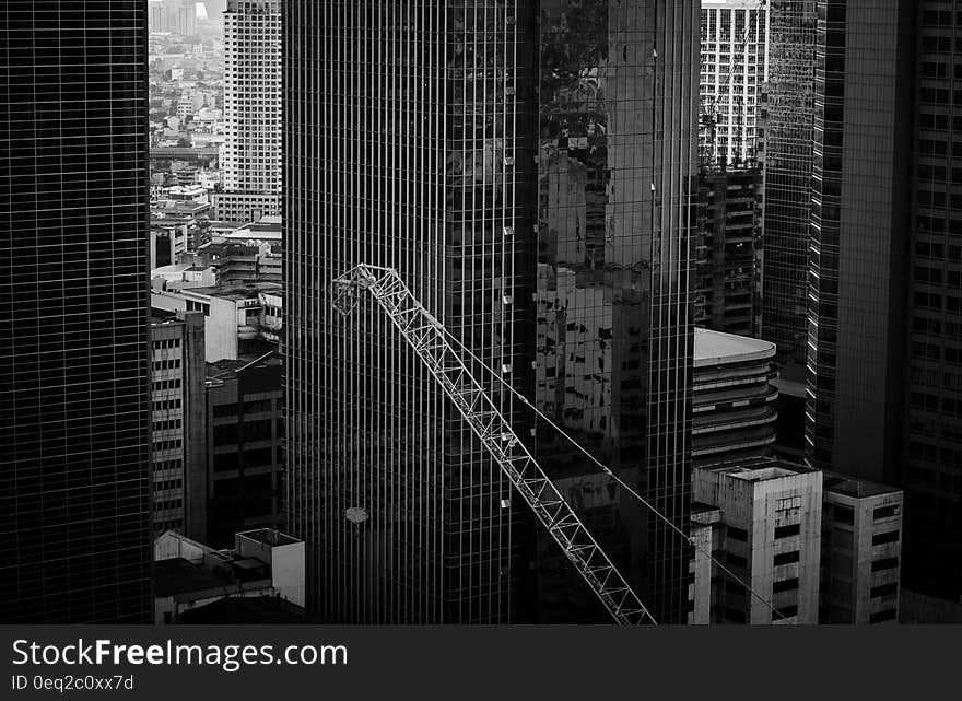 Grayscale Photo of a High Rise Building