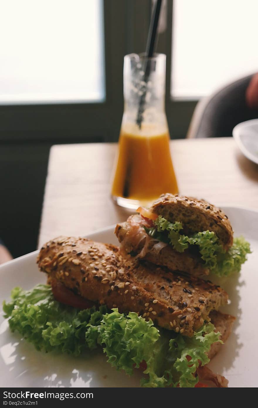 Brown With Green Vegetable Bread on White Ceramic Plate