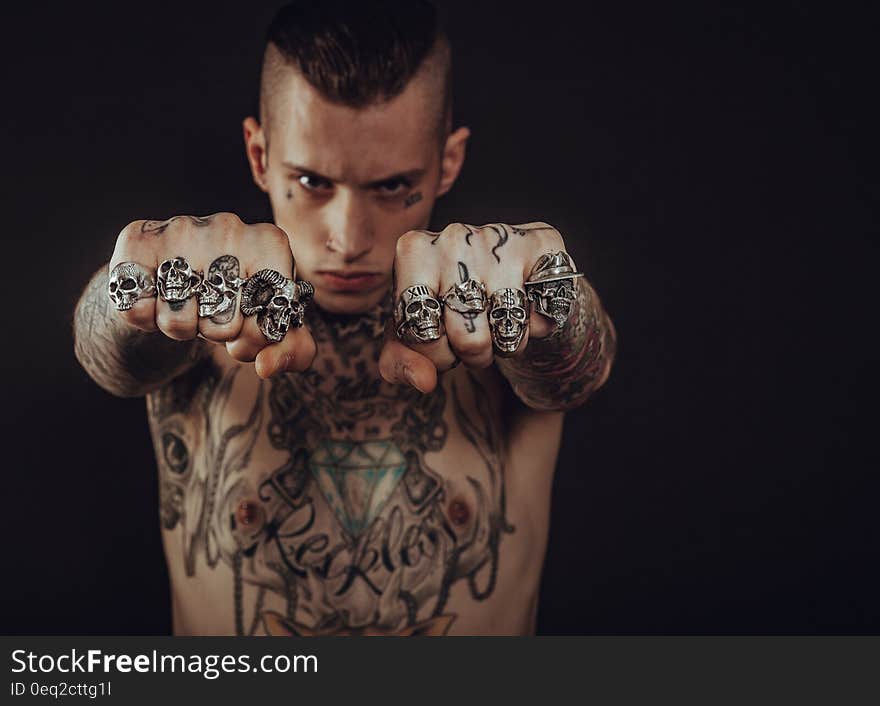 Man Wearing Silver Skull Ring