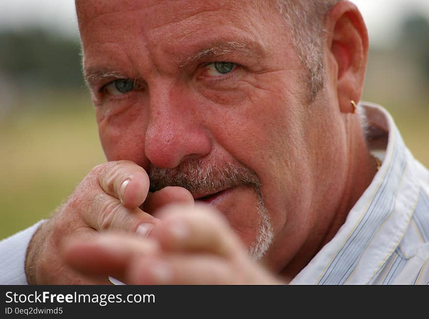 Shallow Focus Photography of Man in White and Blue Dress Shirt