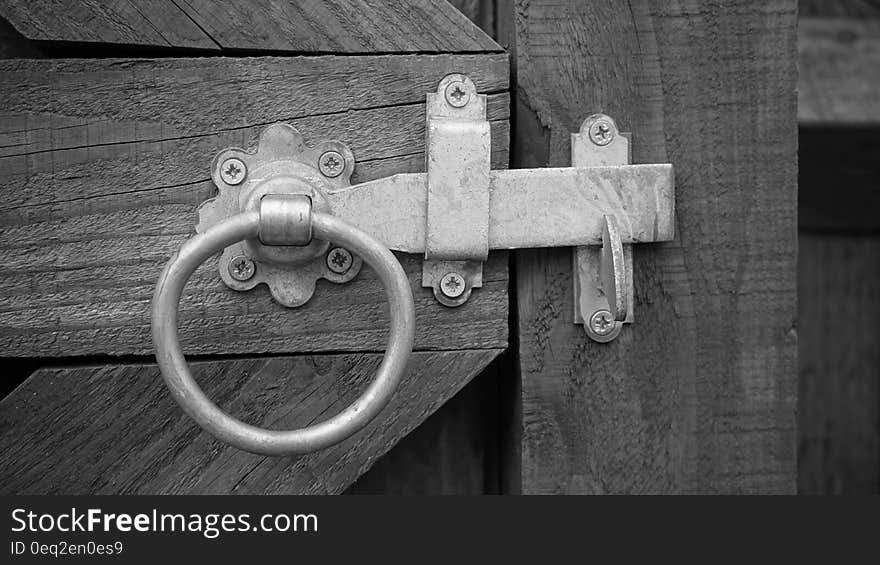 Grayscale Photo of Door Knock