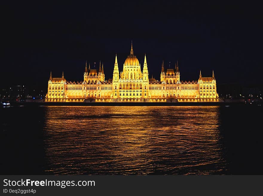 Hungarian Parliament Building with lights at night.