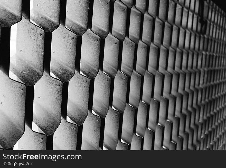 A background of corrugated metal sheets.