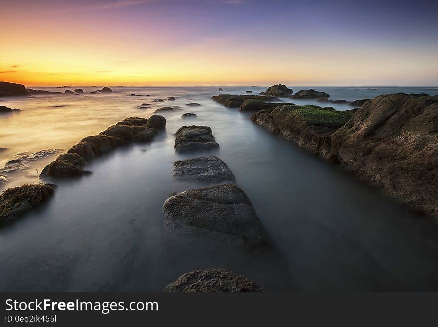 Sea Water Near Shore during Dusk