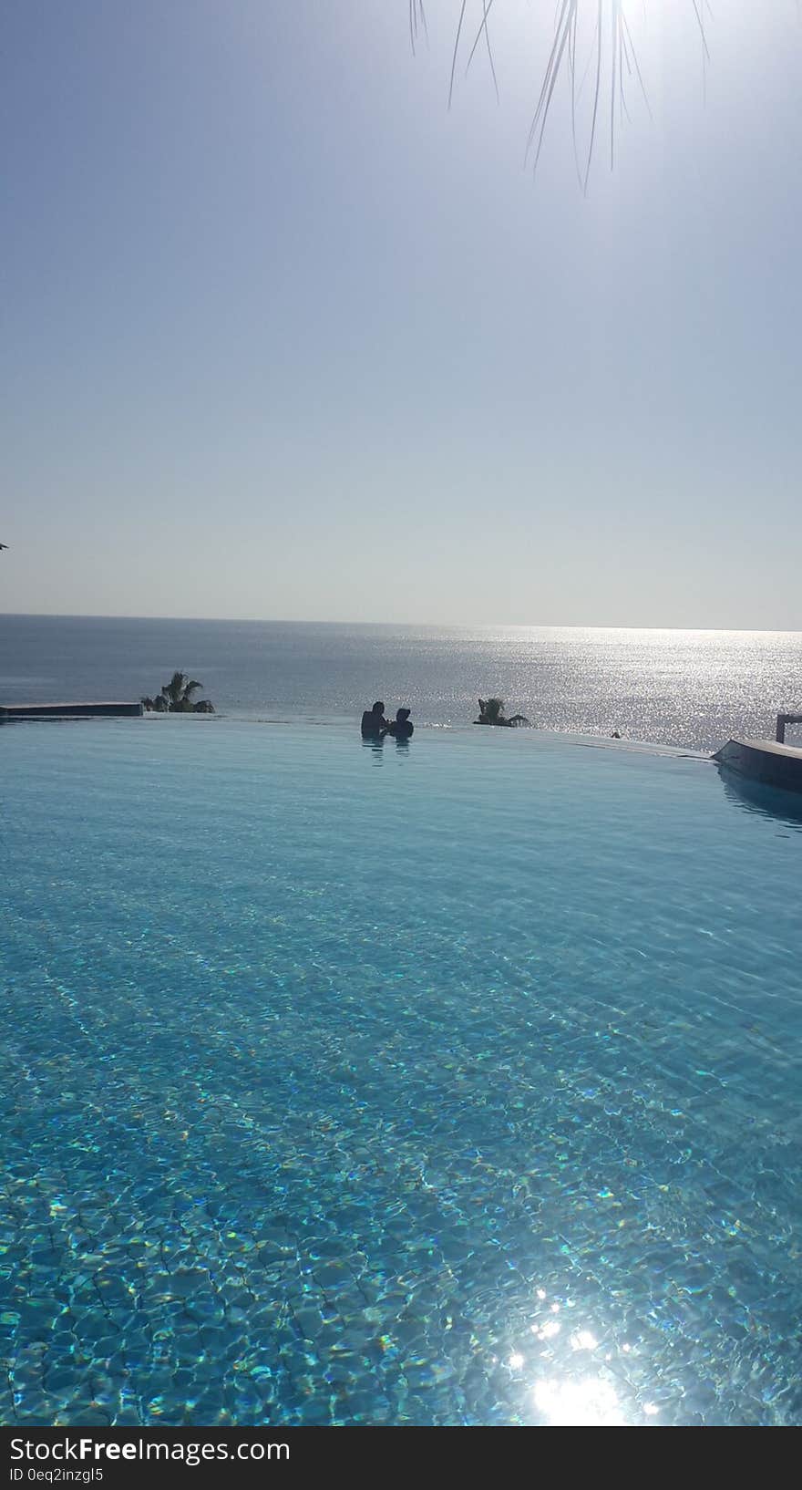 People in Blue Ocean Water during Daytime