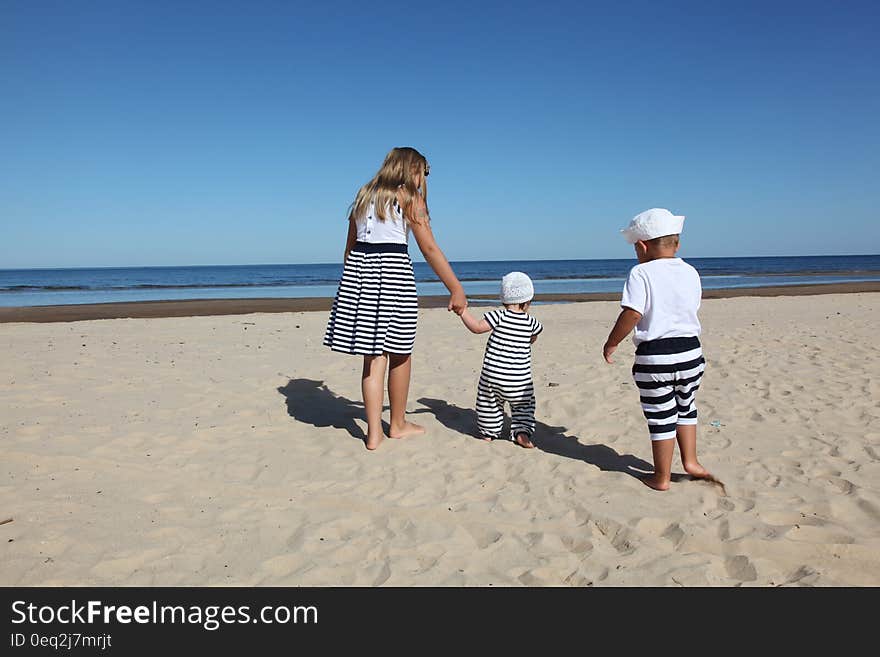 Child Wearing White Crew Neck Shirt