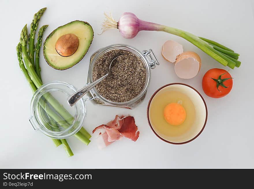 Spices Avocado and Ingredients on Table