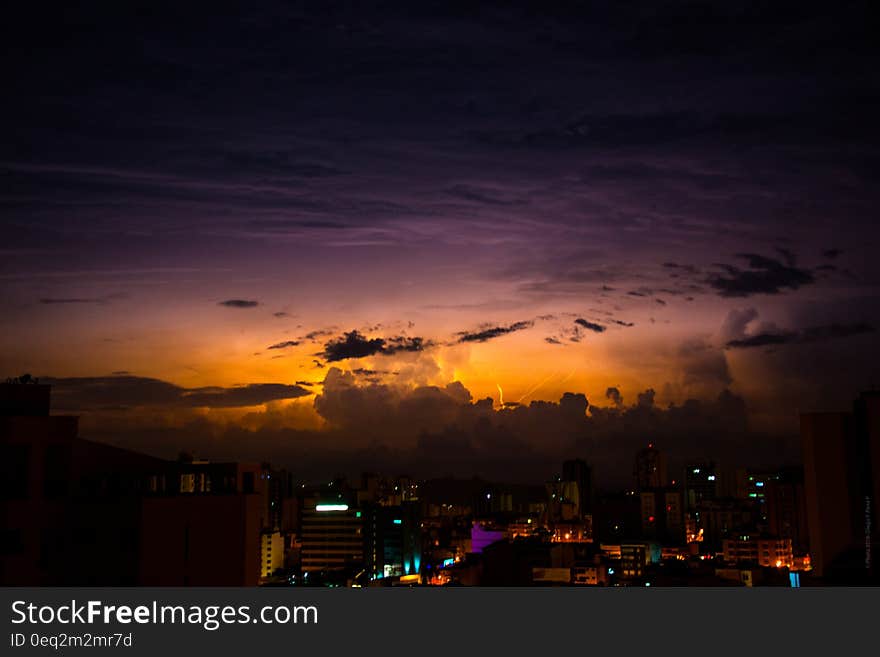 High Rise Buildings Under Nimbus Clouds