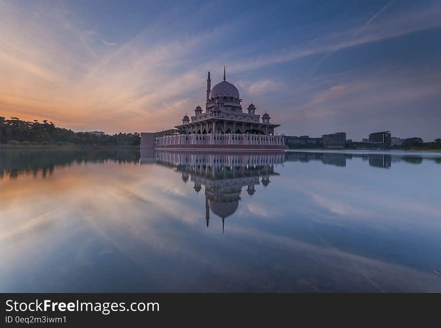 White Dome Building Reflected on Water