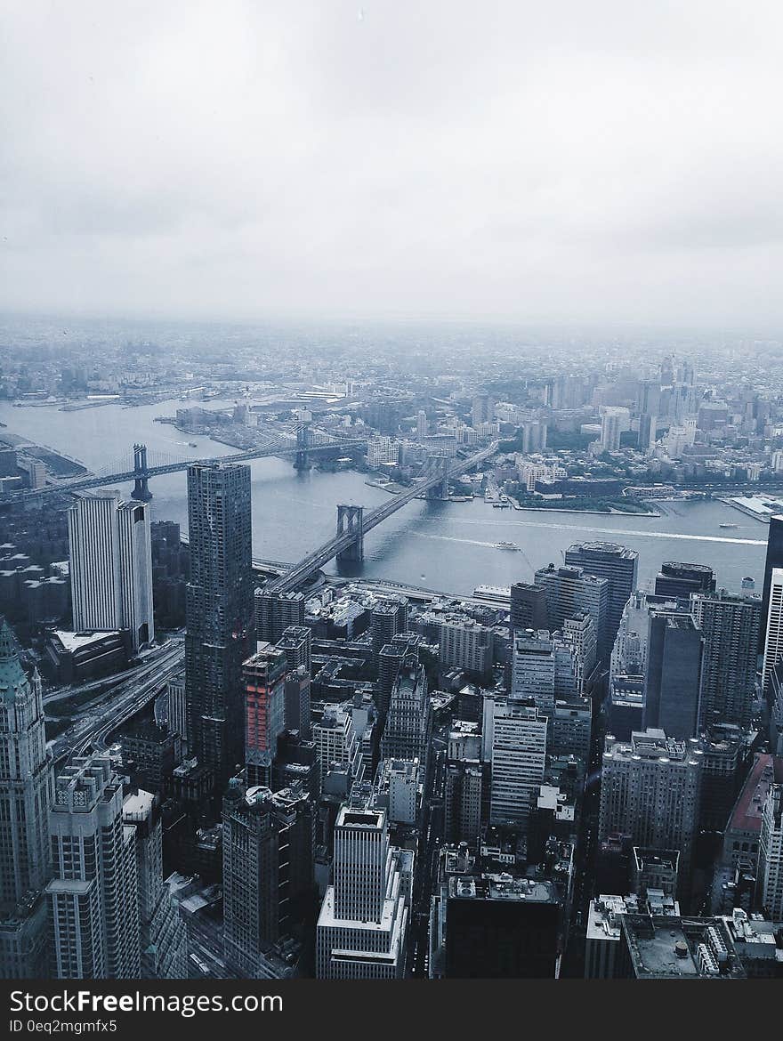 High Rise Building Under Grey Sky at Daytime