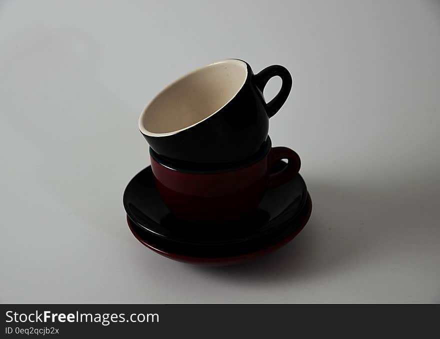 Red and Black Ceramic Mugs