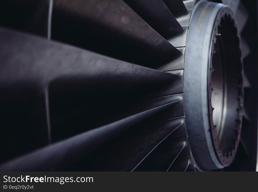 A close up shot of an airplane engine turbine.