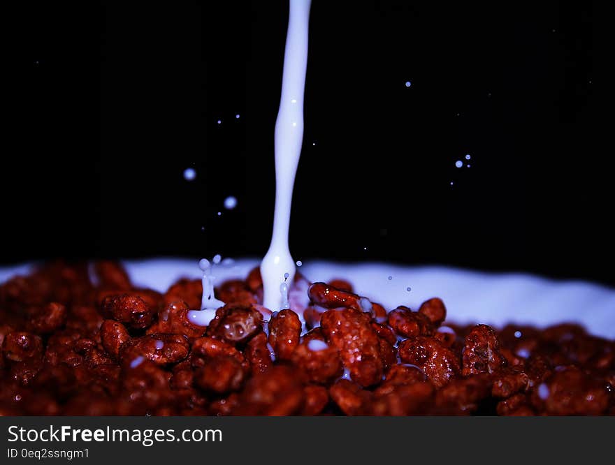 A closeup of a bowl of cereals.