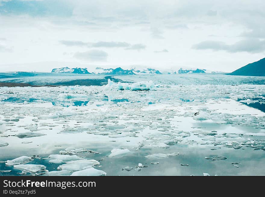 Scenic view of thawing glacier and lagoon, Iceland. Scenic view of thawing glacier and lagoon, Iceland.