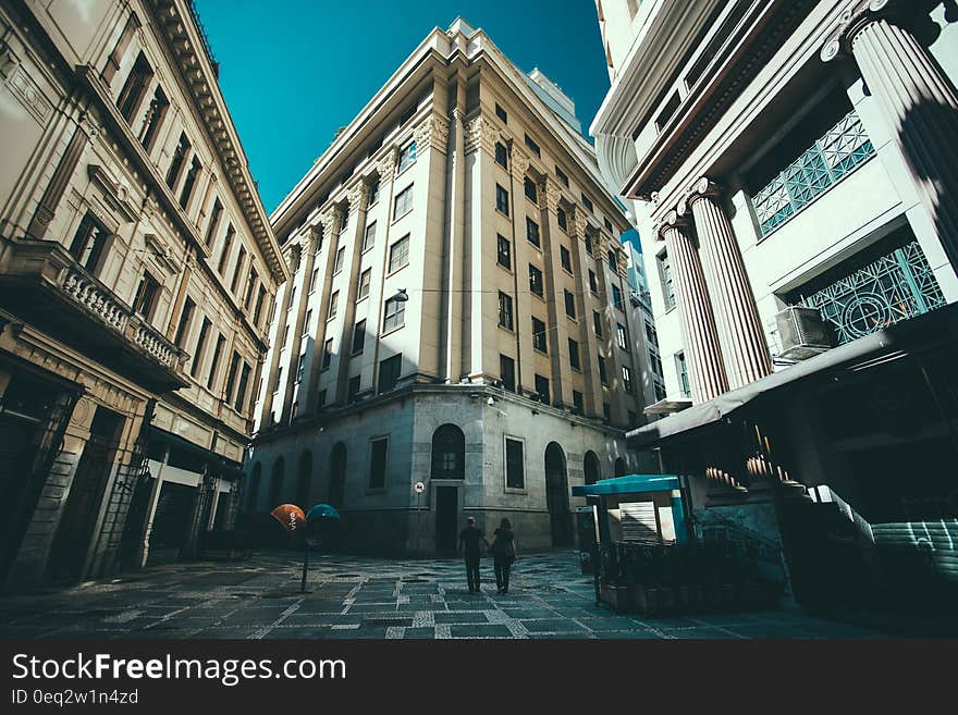 A building in a city shot from a below angle. A building in a city shot from a below angle.